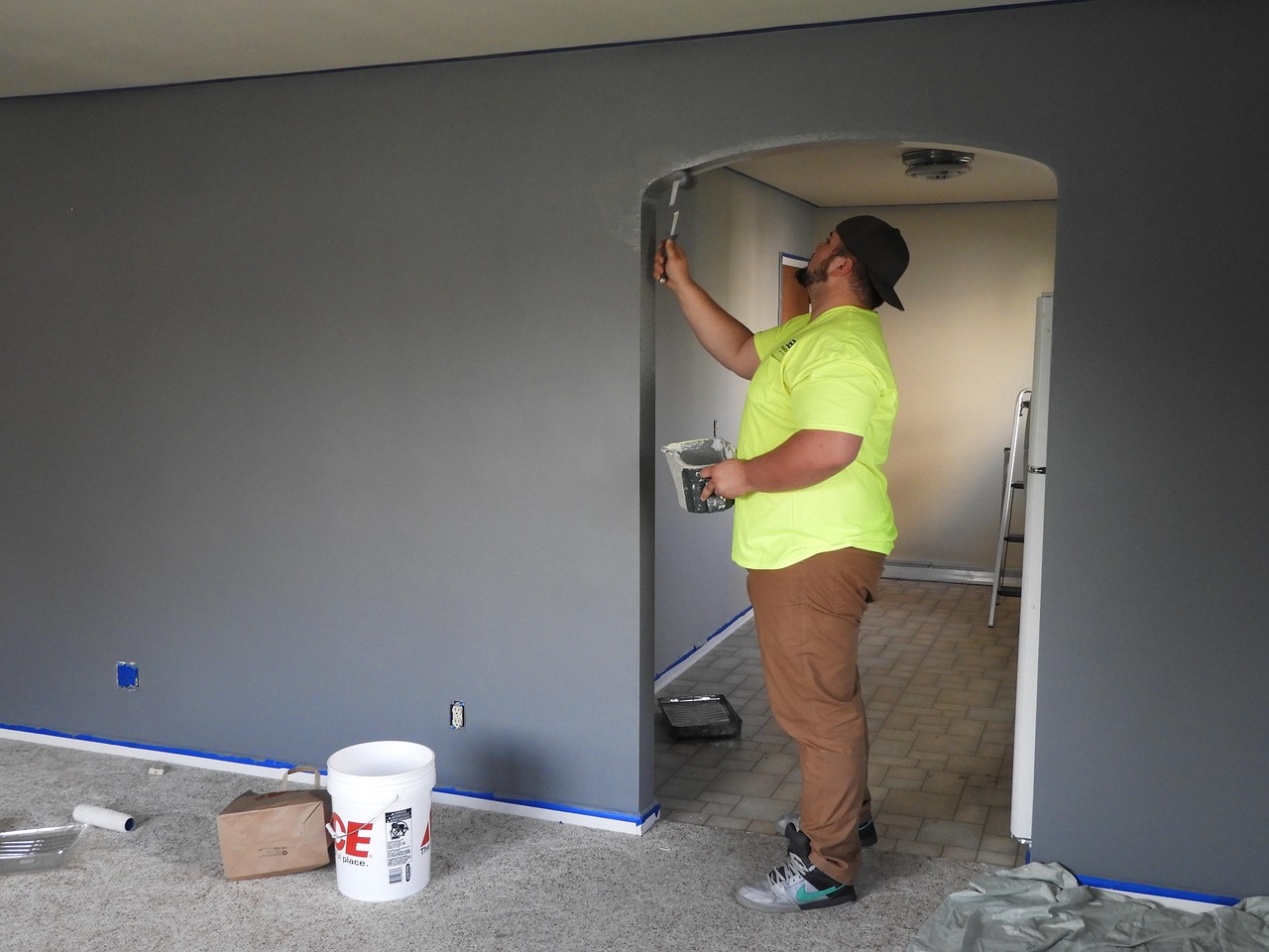 Painter, paint, house — "Energy-Efficient Windows for Redmond Homes: Save Money and Stay Comfortable"